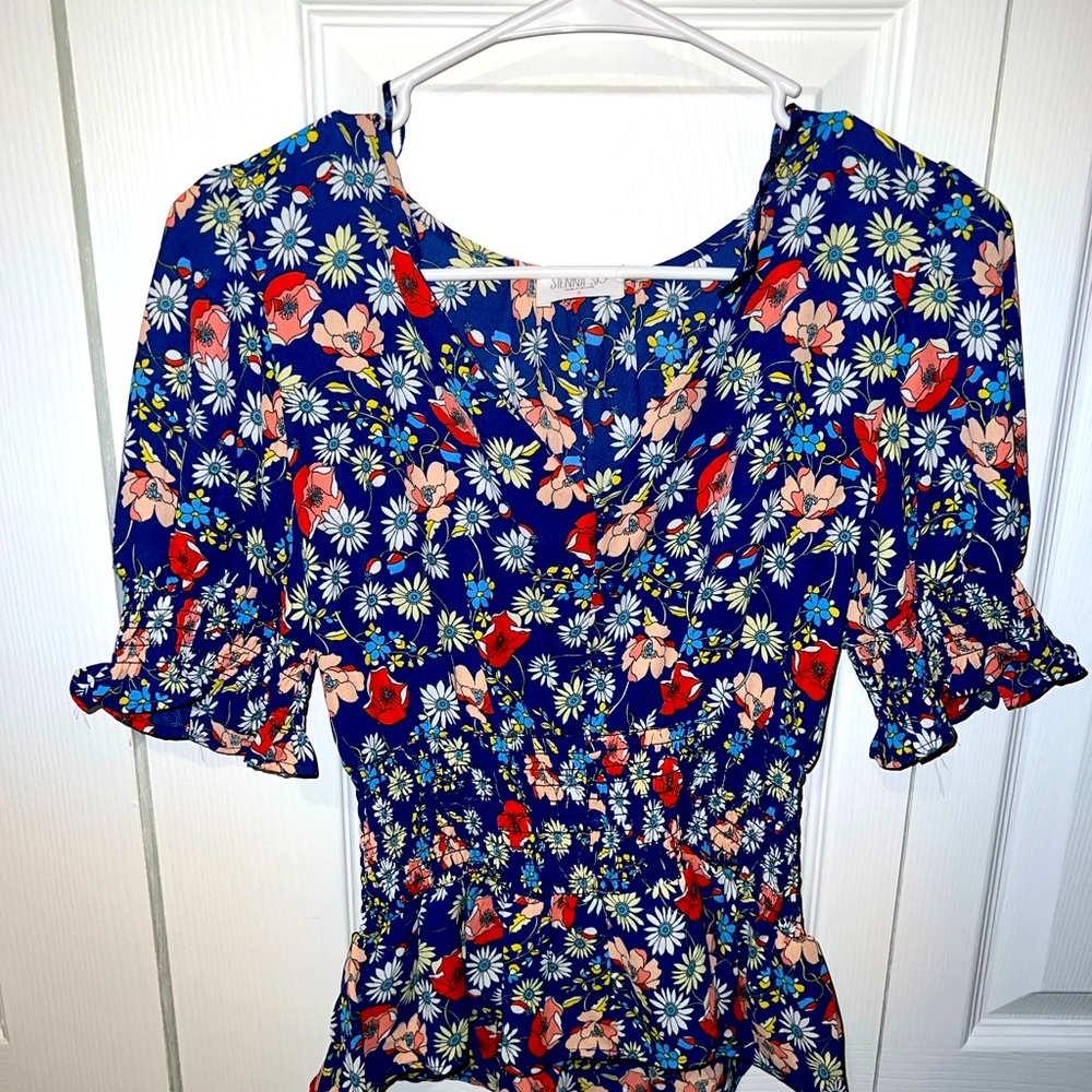 Newly bought, never worn flowery blouse size small